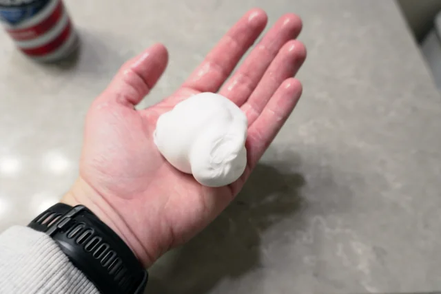 A mound of Barbasol shaving foam in my open palm