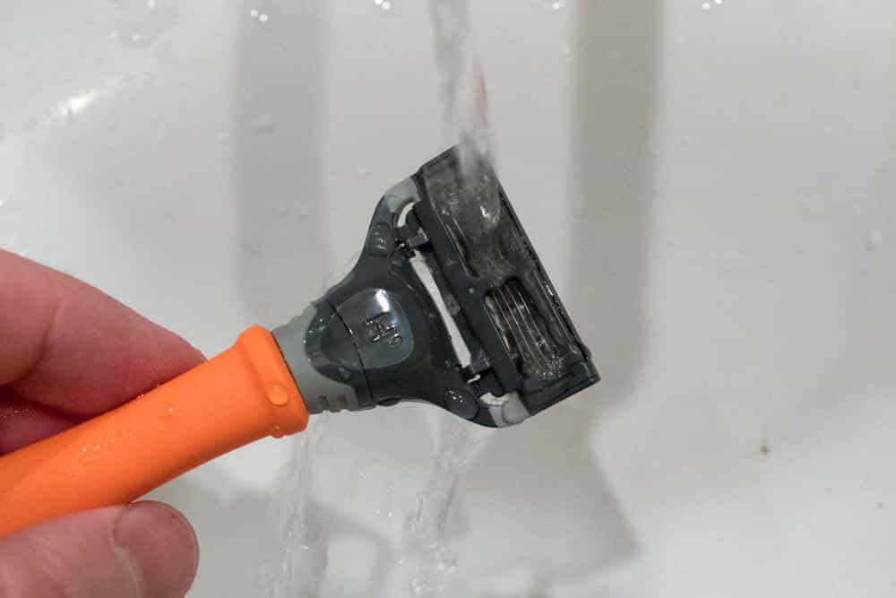 rinsing harrys razor under water