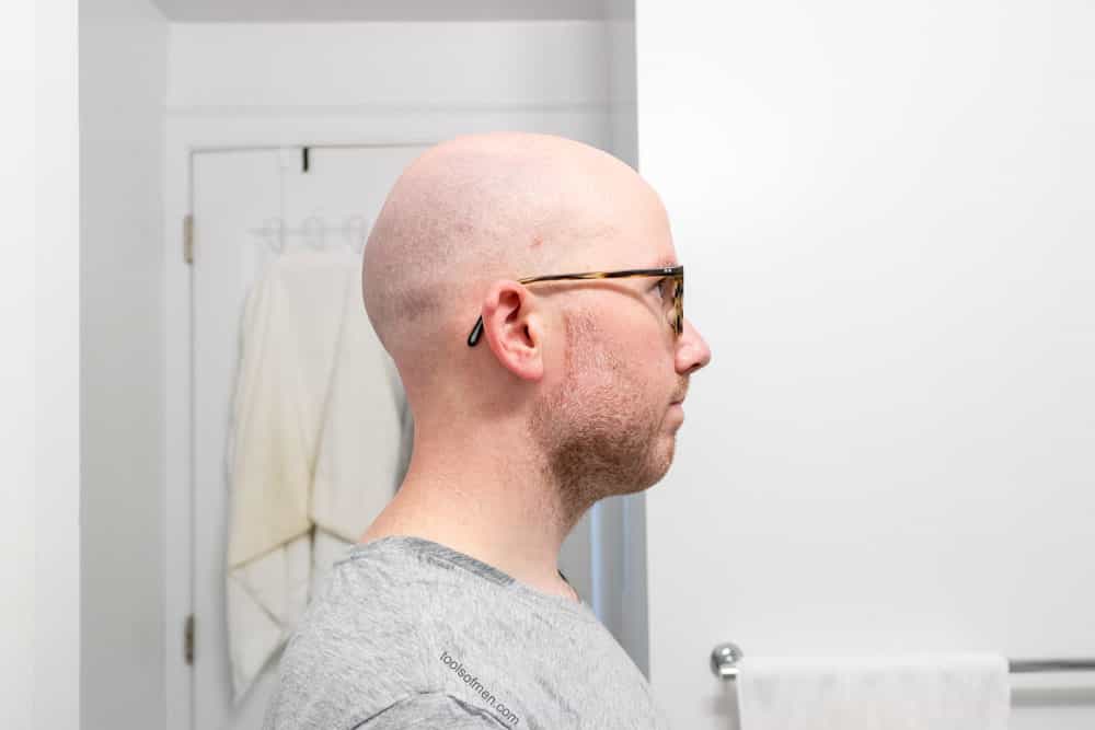 man standing to the side demonstrating how headblade moto performed