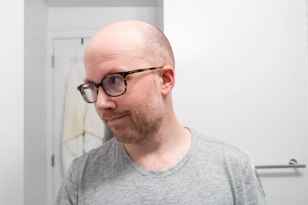 man with short stubble hair length on head prior to shaving