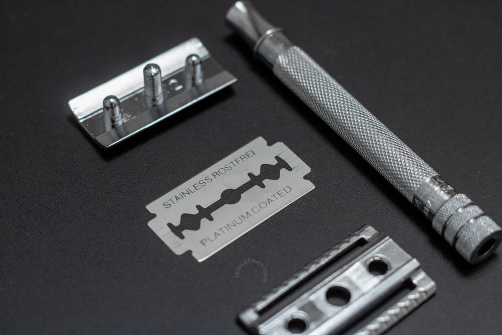 merkur 23c parts on a black mat