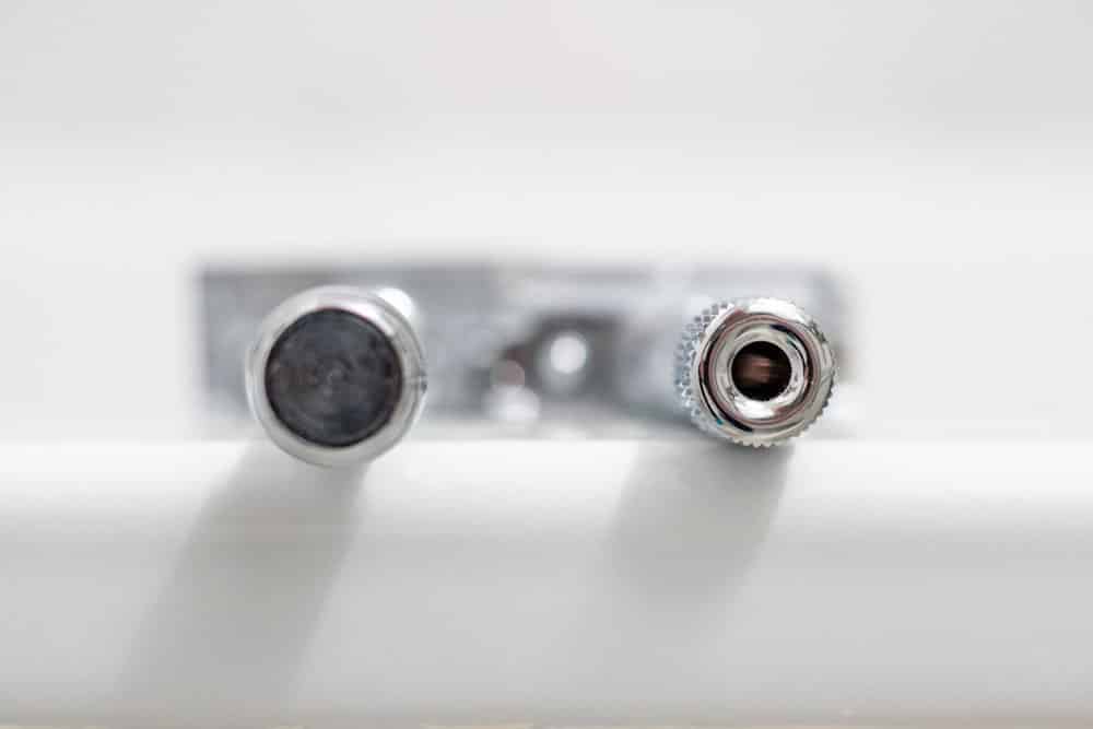 bottom of the handle of the 38c and 34c