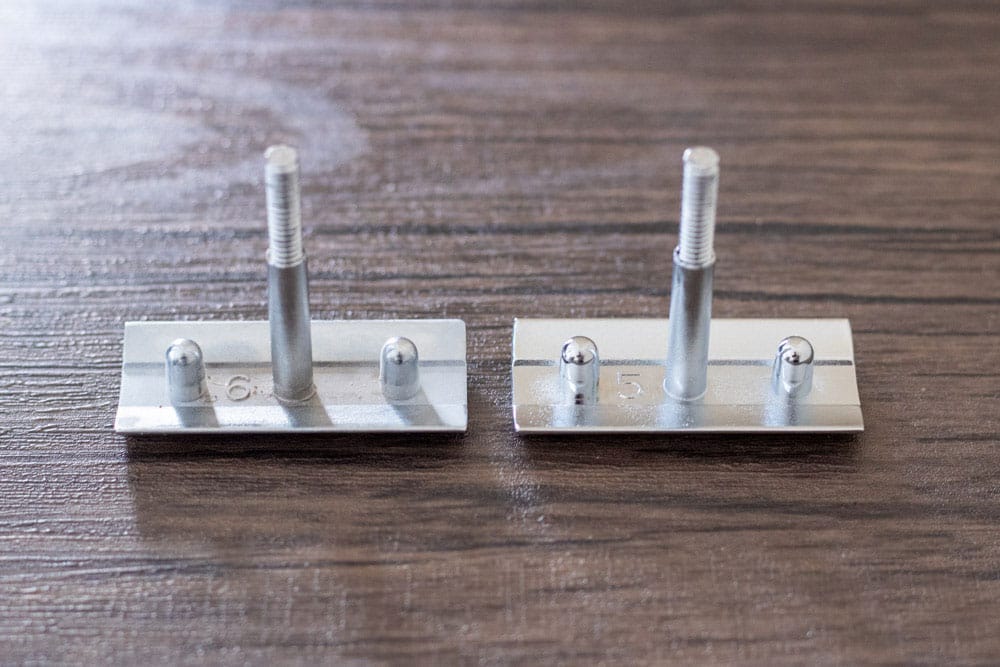 razor caps of both the 34c and 38c standing next to each other