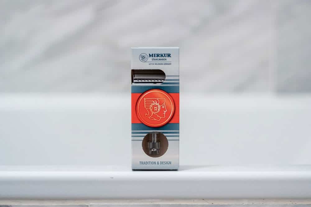 merkur 34c in box on bathtub ledge