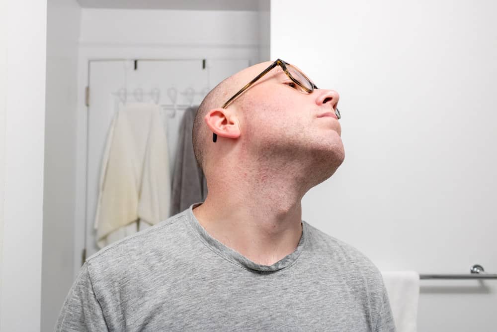 man looking up to show neck after using merkur 37c