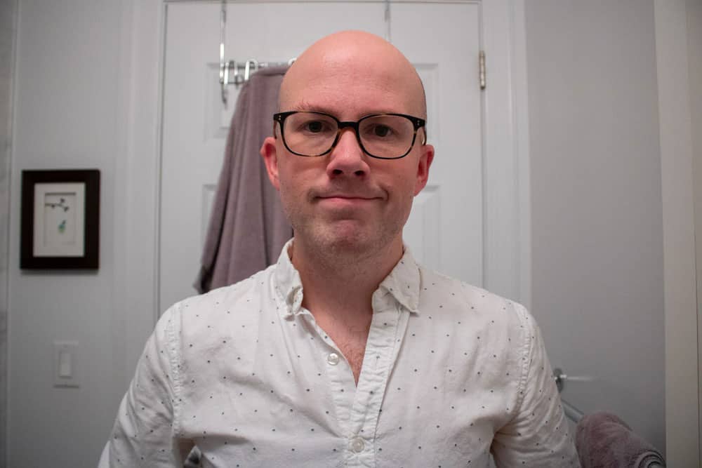 man looking straight to show face after shaving with the merkur 38c