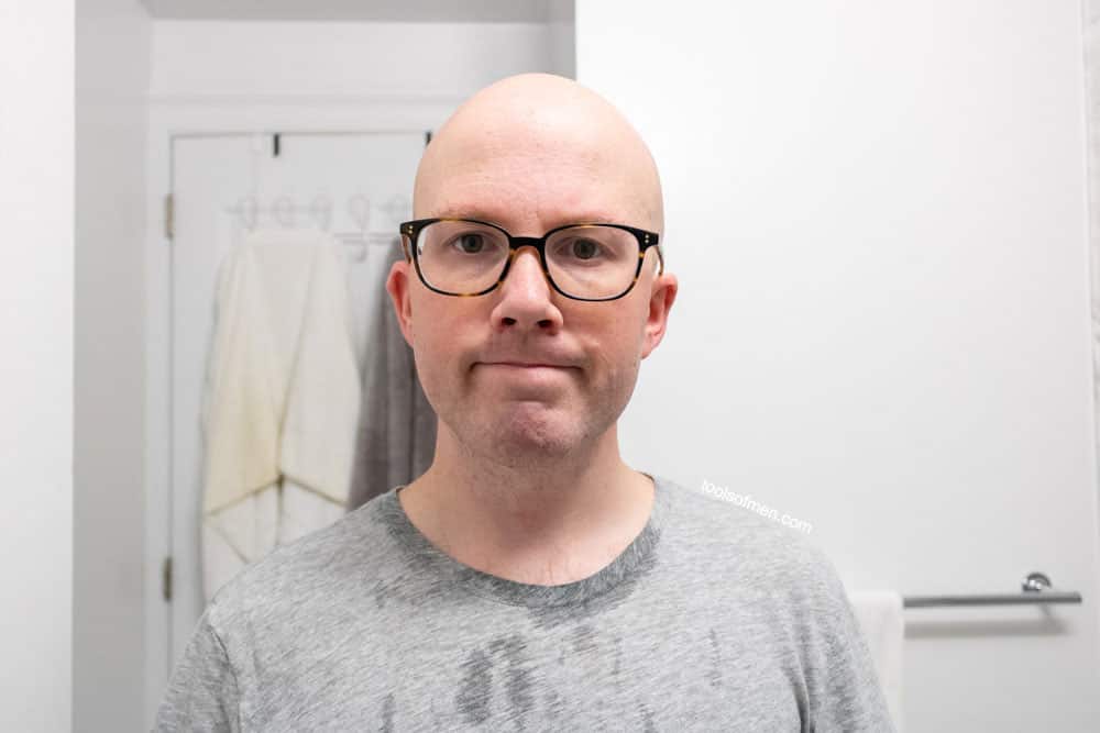 man smiling at camera after shaving