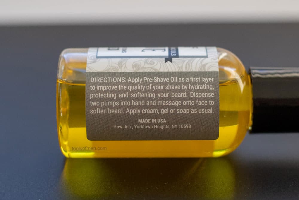 closeup of label to show that taconic pre shave oil is made in the usa