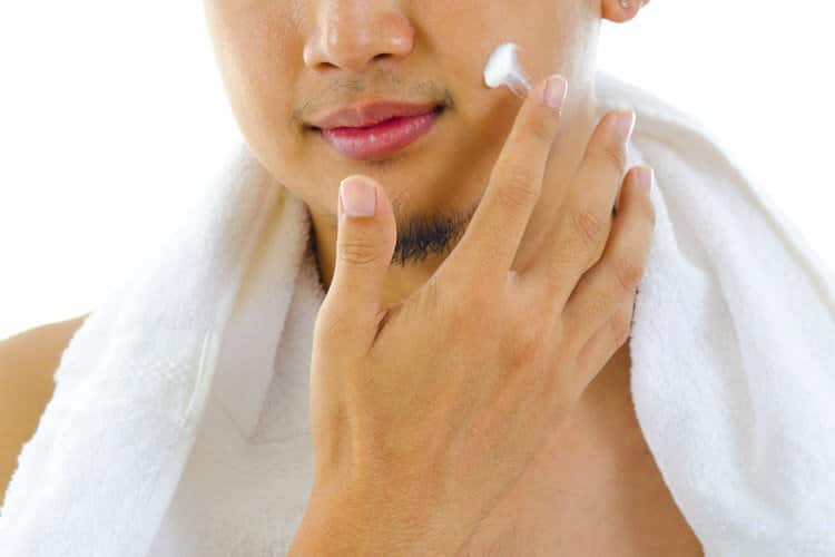applying a face moisturizer daily