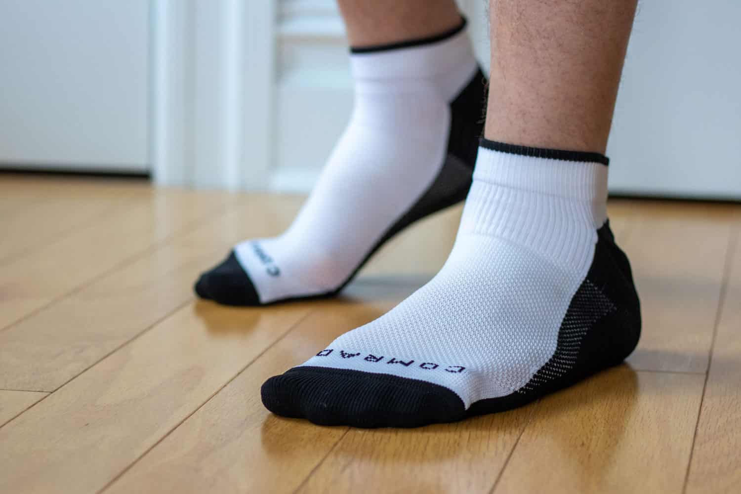 man wearing comrad socks inside