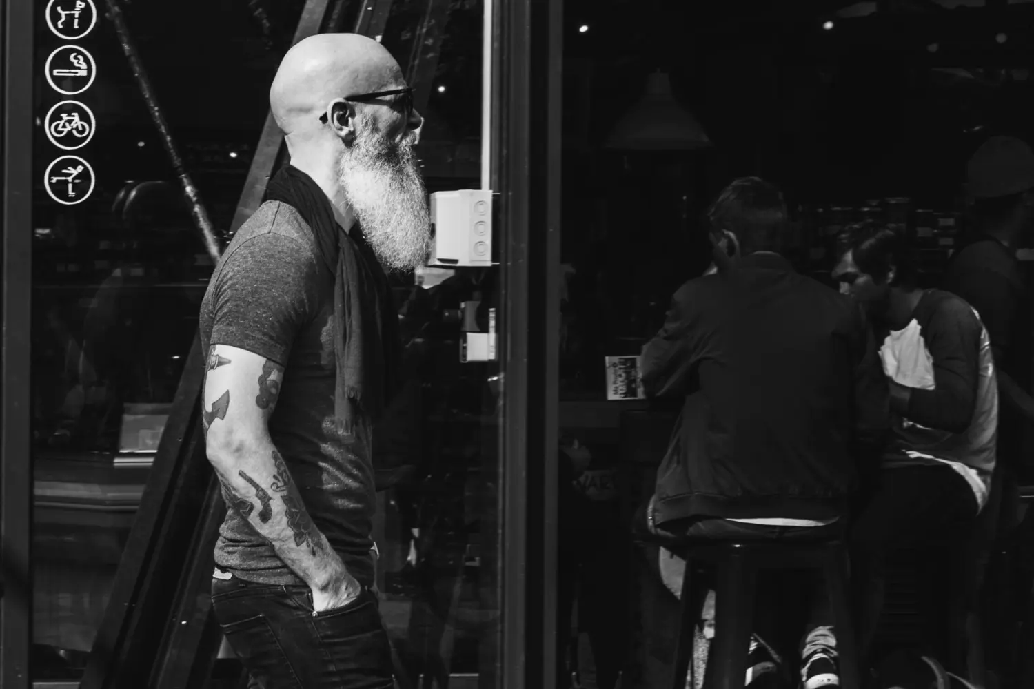 bald man walking with beard