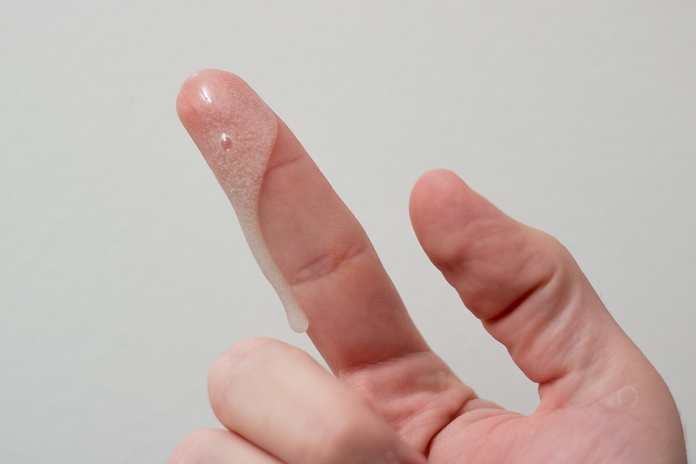 beast skincare face wash on fingertip to demonstrate thickness