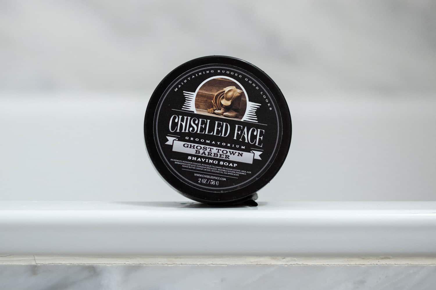 chiseled face ghost town barber shave soap on bath ledge
