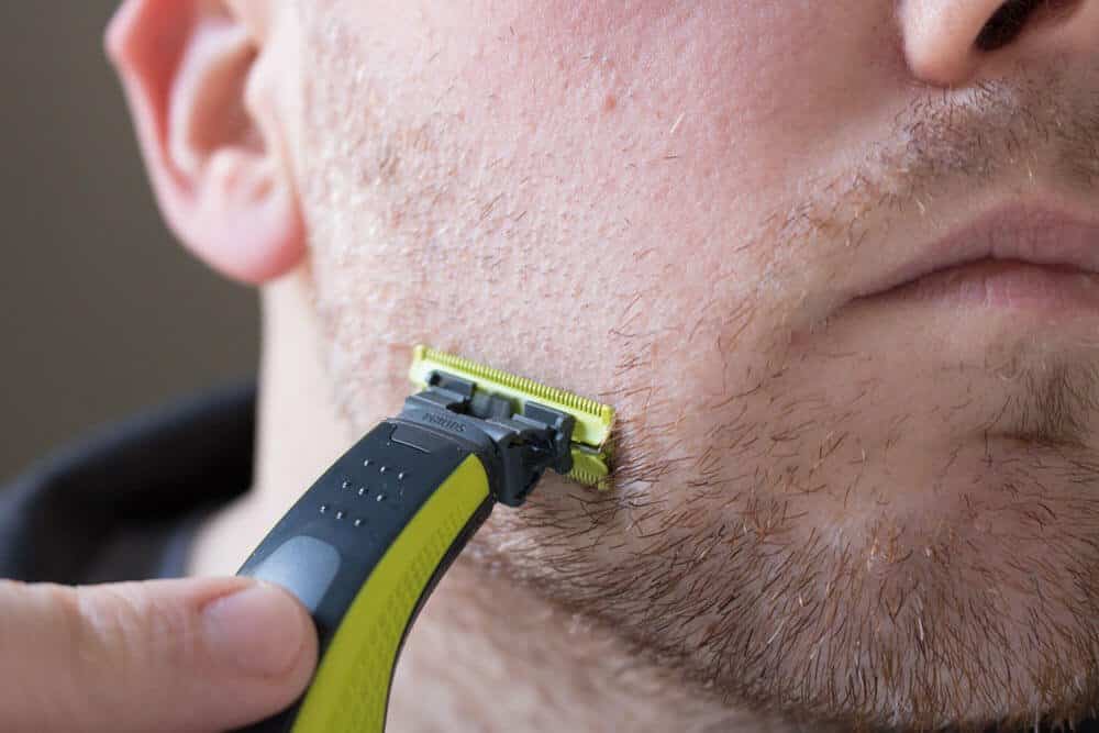 closeup of cheek on a partial pass with the oneblade trimmer