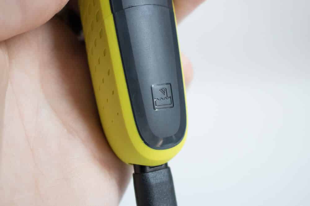 closeup of the water resistence label on the oneblade trimmer