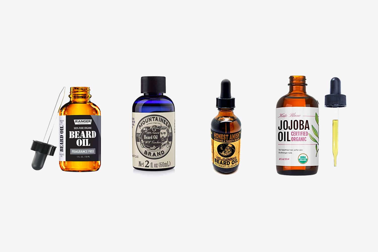 four beard oils on an isolated background