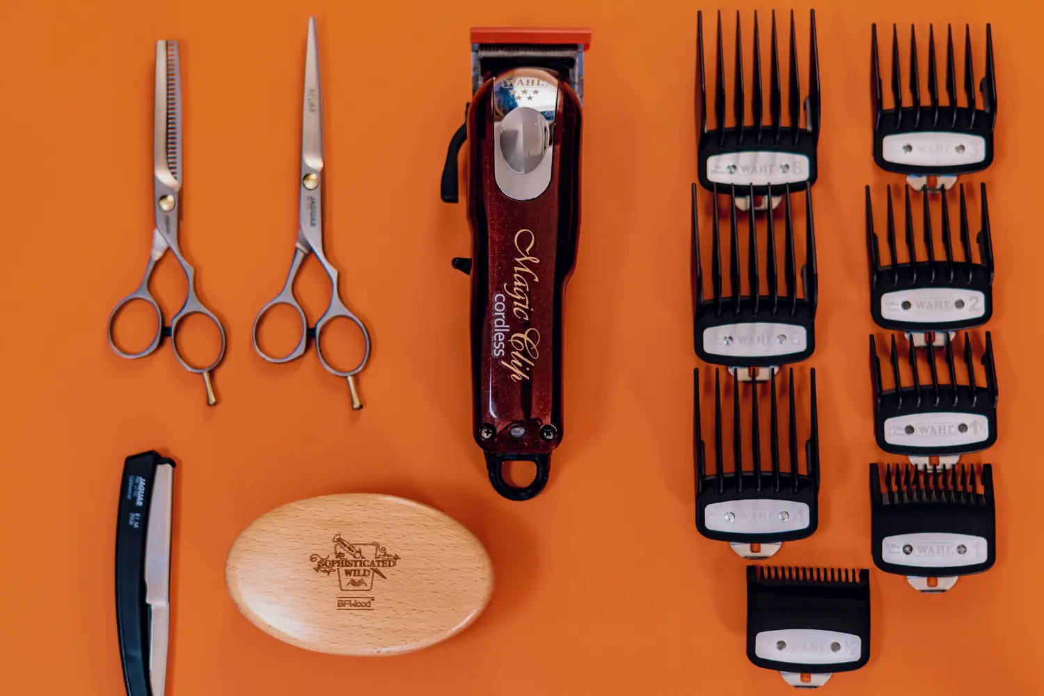 hair cutting supplies on orange board