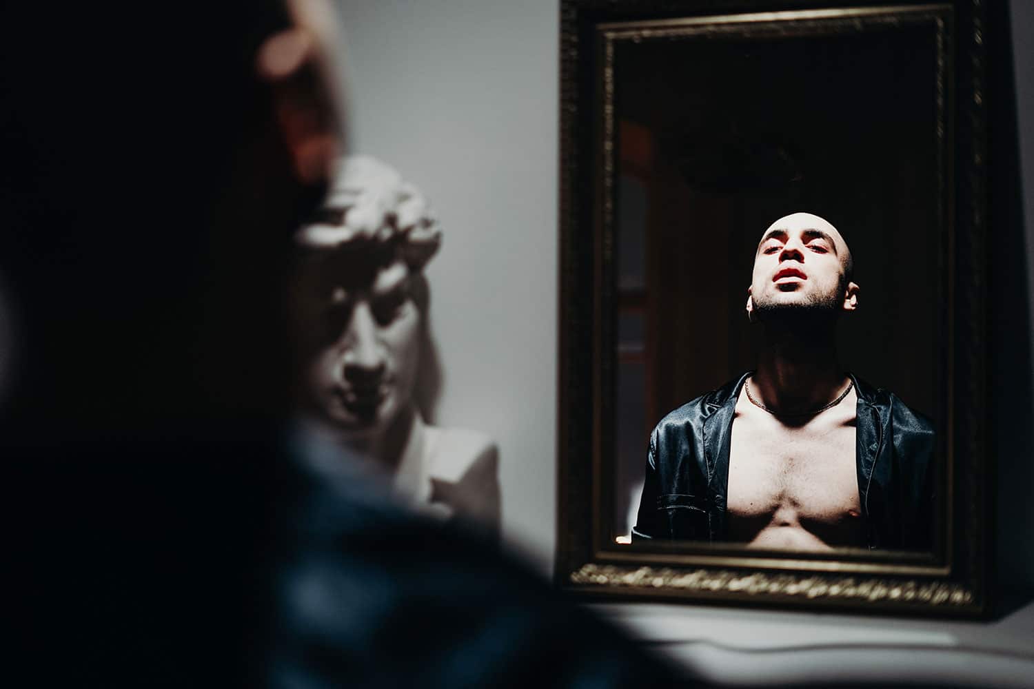 man in front of the mirror