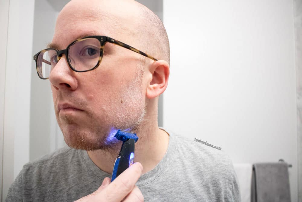 man shaving beard with microtouch solo