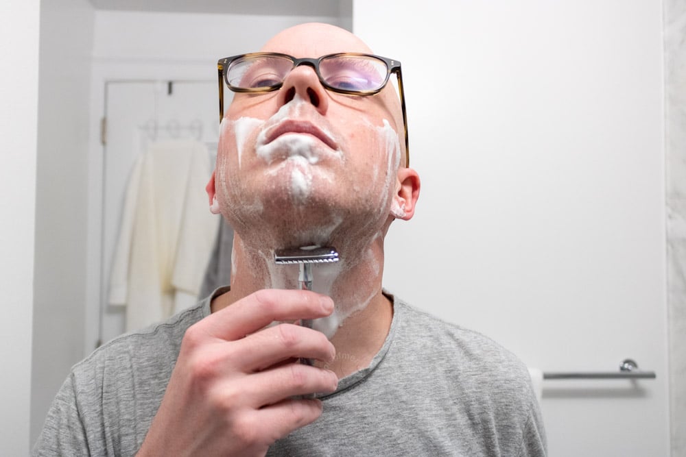 man shaving neck with merkur 23c