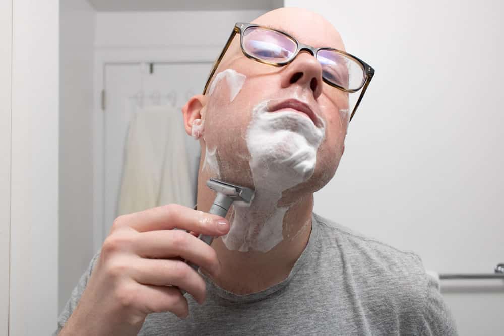 man shaving neck with merkur futur
