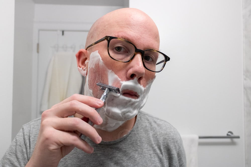 man shaving with a merkur 23c