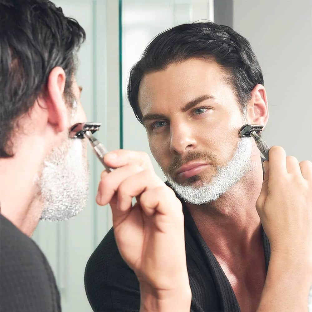 man shaving with the rockwell 6c