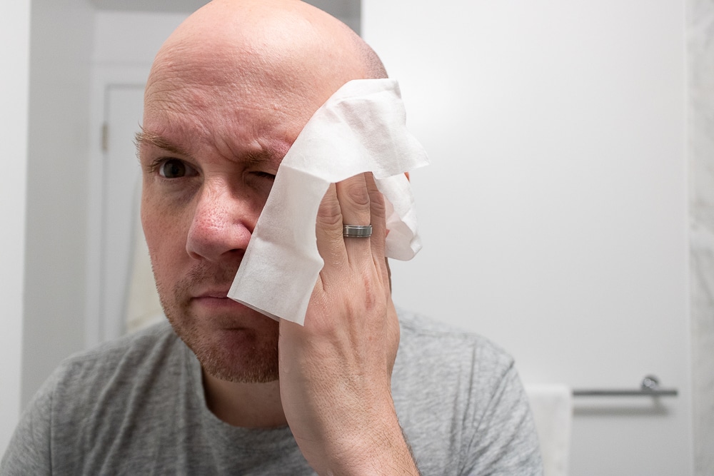 man using ursa major face wipes