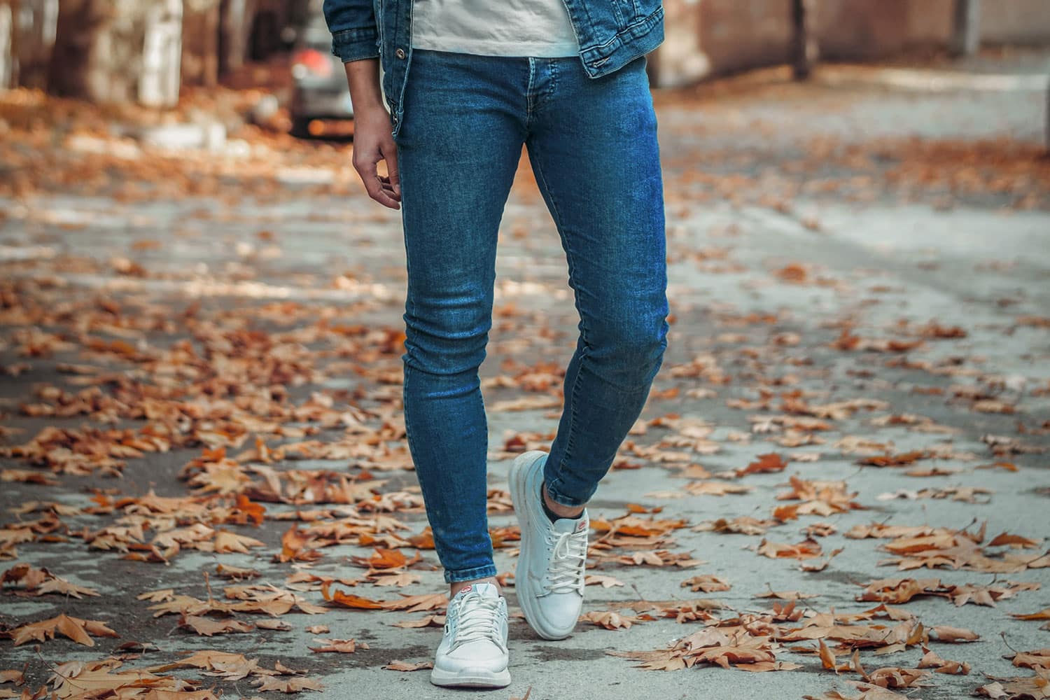 man wearing a pair of denim jacket and skinny jeans
