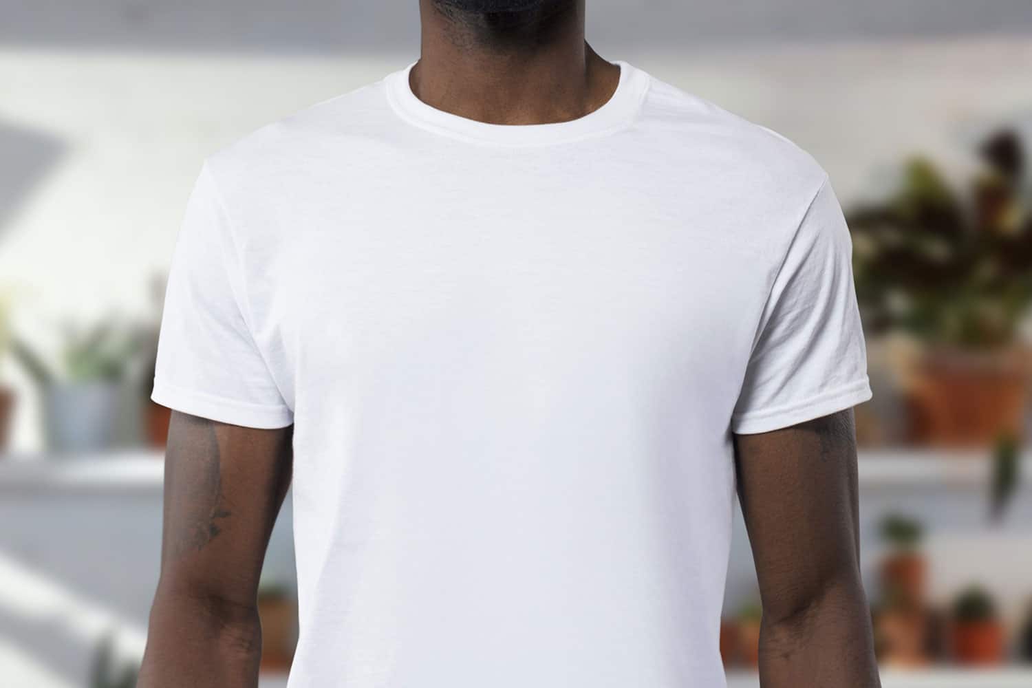 man wearing white undershirt