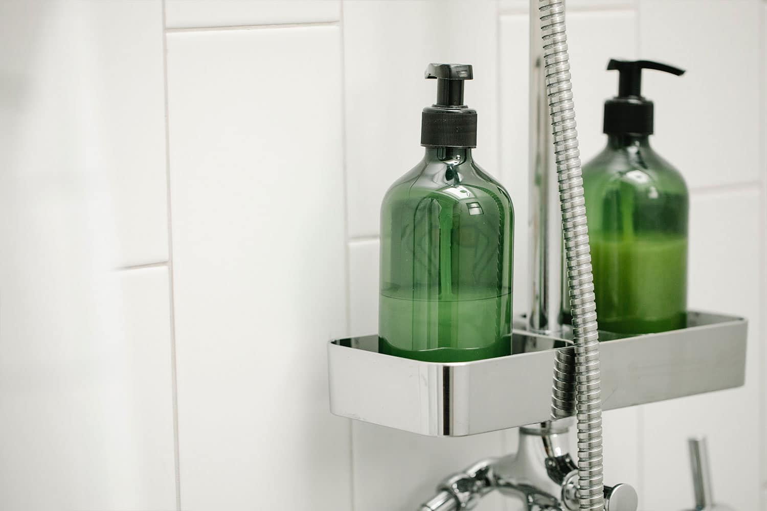 organic shampoo in a green bottle