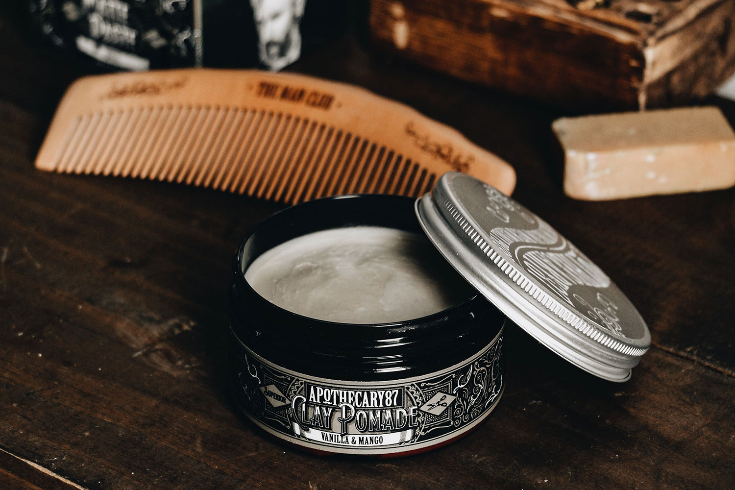 pomade on the wooden barber table