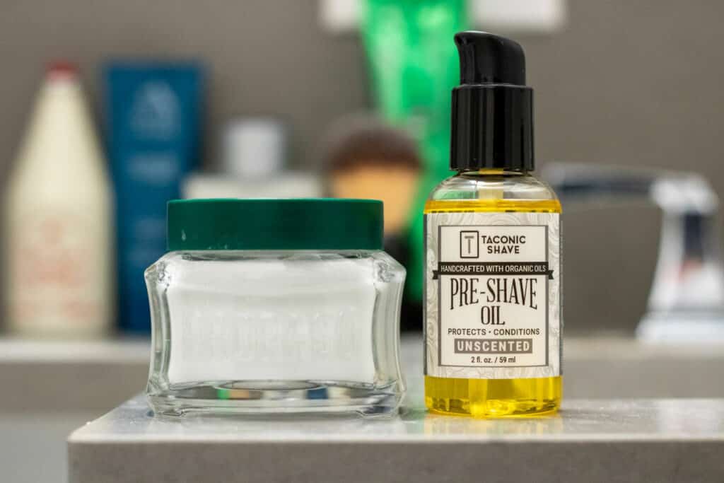 pre shave oil and cream on bathroom countertop