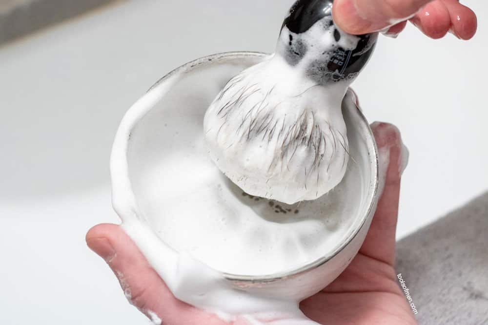 shaving brush coated with shaving cream