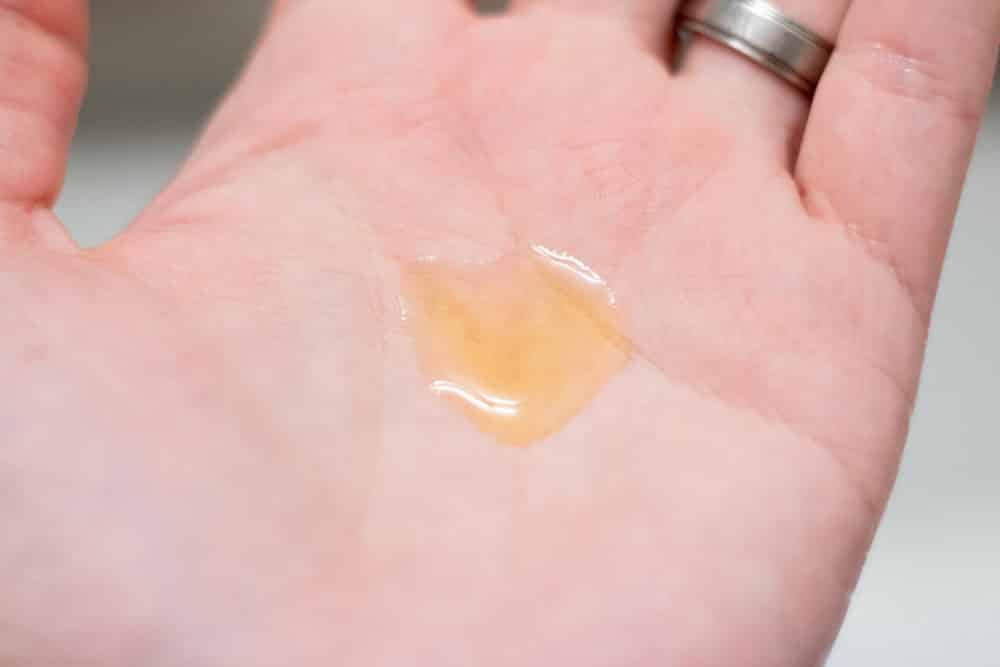shaving oil in palm