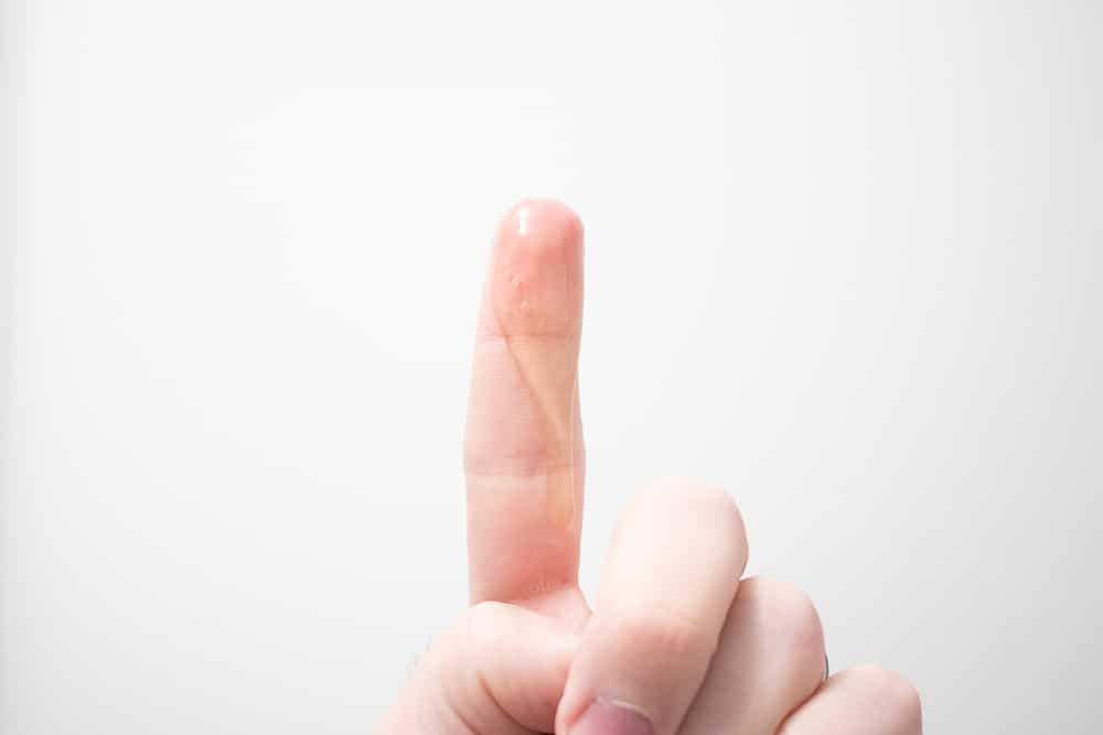 ursa major face wash on finger tip to demonstrate viscosity