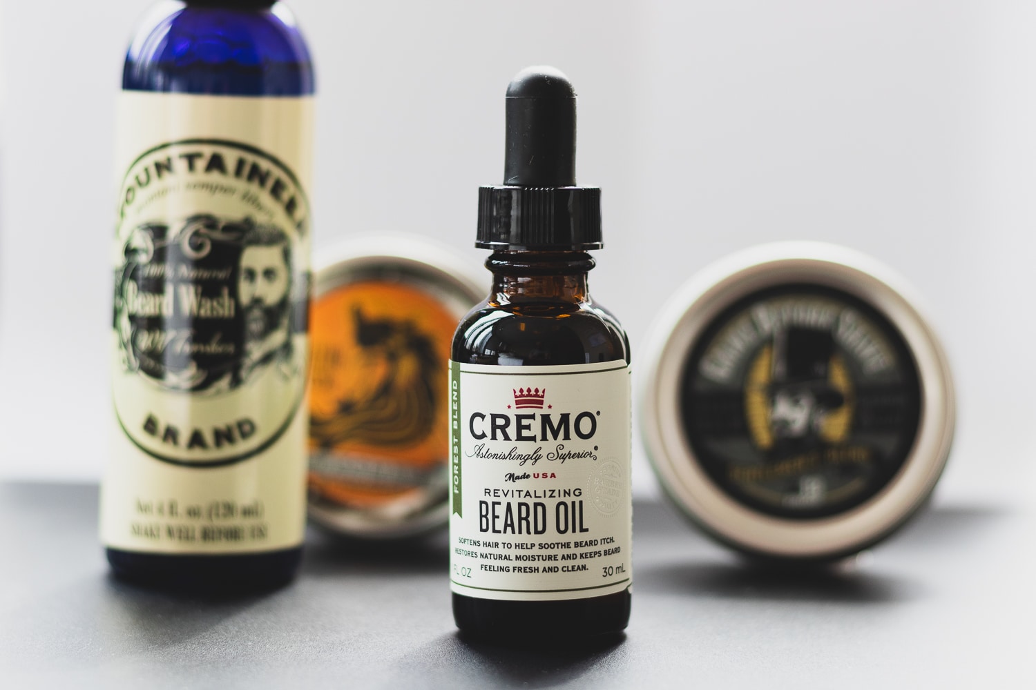 various beard conditioners on a table