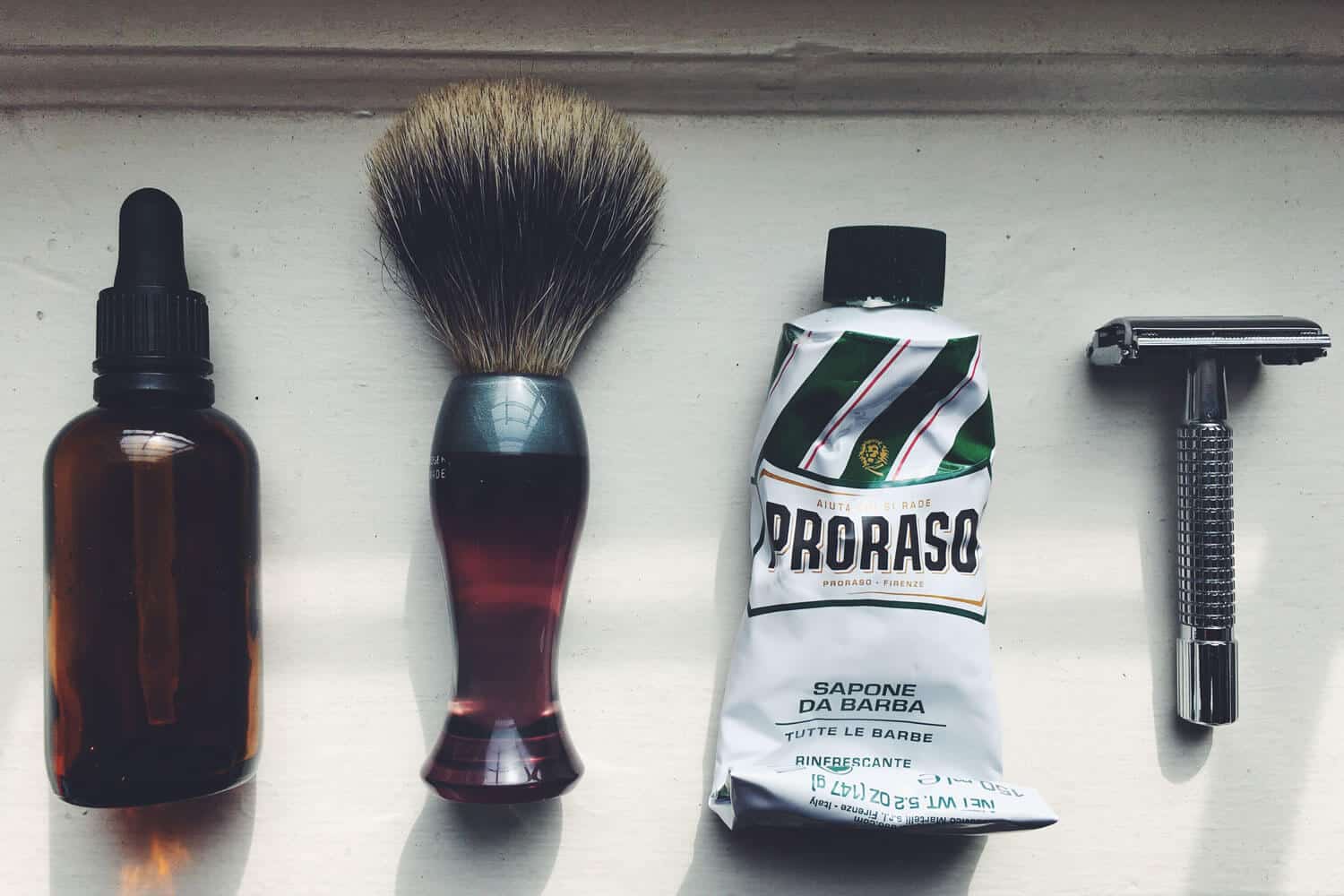 various grooming products on a window sill