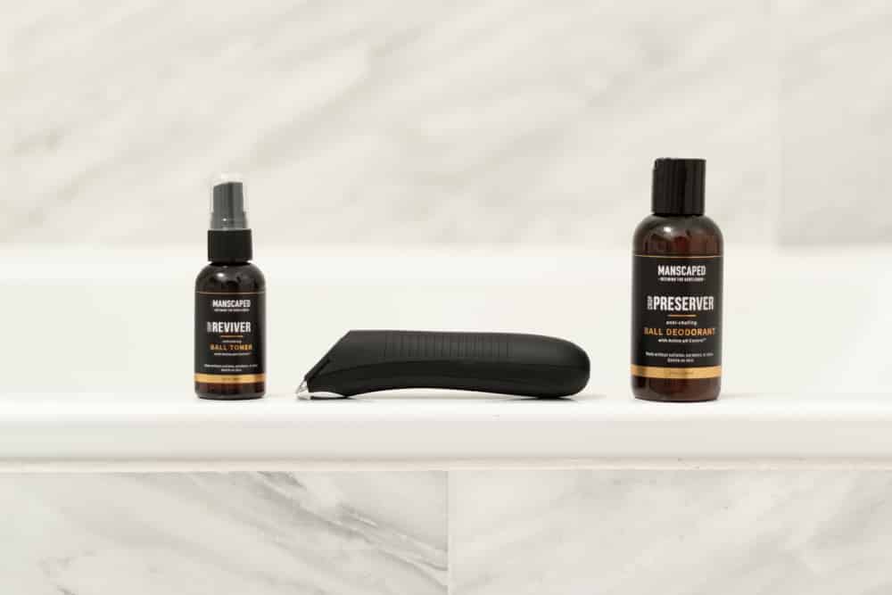 various manscaped products on bathtub ledge