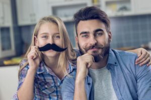 woman and man with mustaches on