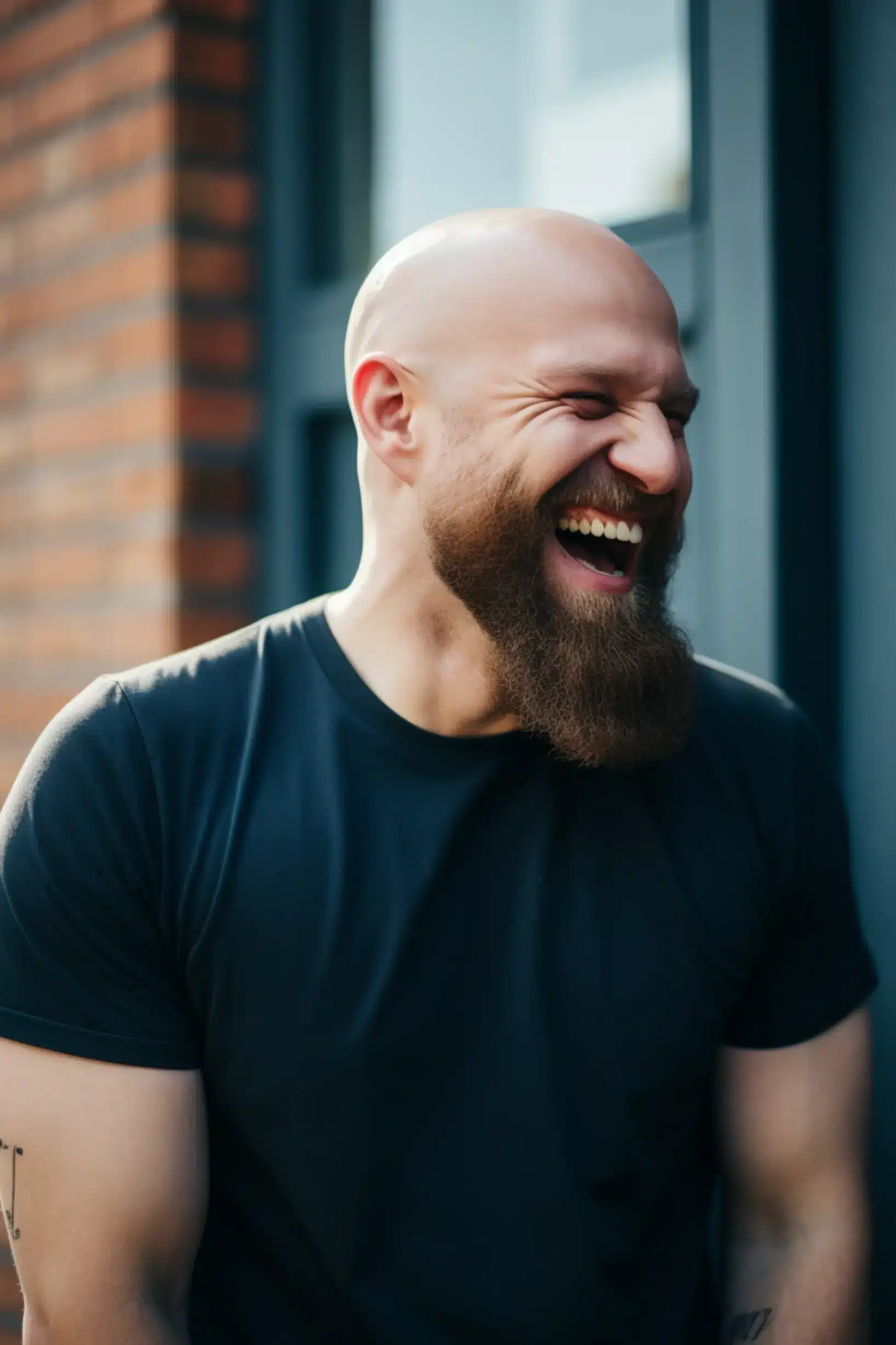 bald man laughing